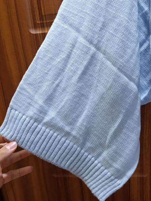 Elera bebe mavisi triko kazak — yumuşak örgü doku ve ribana detayı